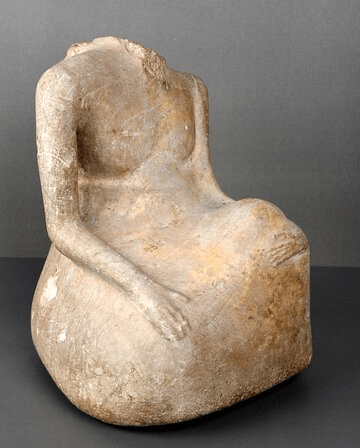  The Seated Nobleman with head missing. A limestone sculpture excavated from Mohenjo Daro in 1925.